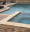 Unfilled & Honed Ivory Travertine Coping - 12" x 12"