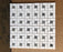 Thassos White Marble Mosaic - 5/8" x 1 1/4" Pinwheel with Gray Dots Polished